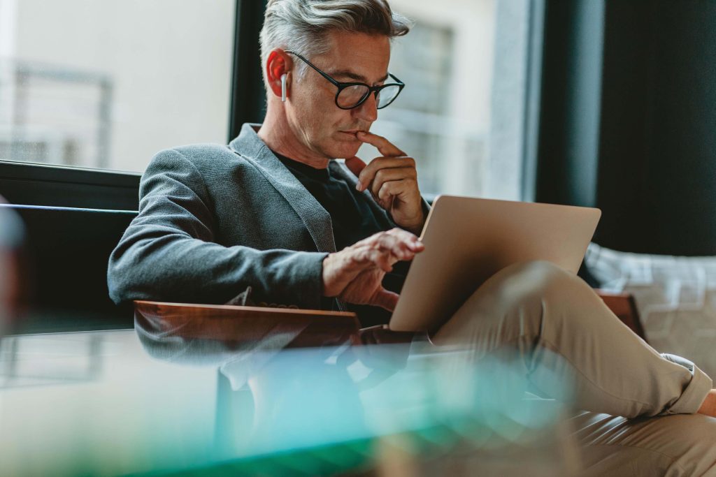 Business man working on a tablet at an office