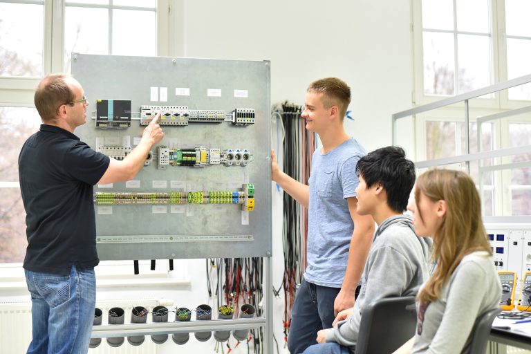 Students learning about wiring and electricity