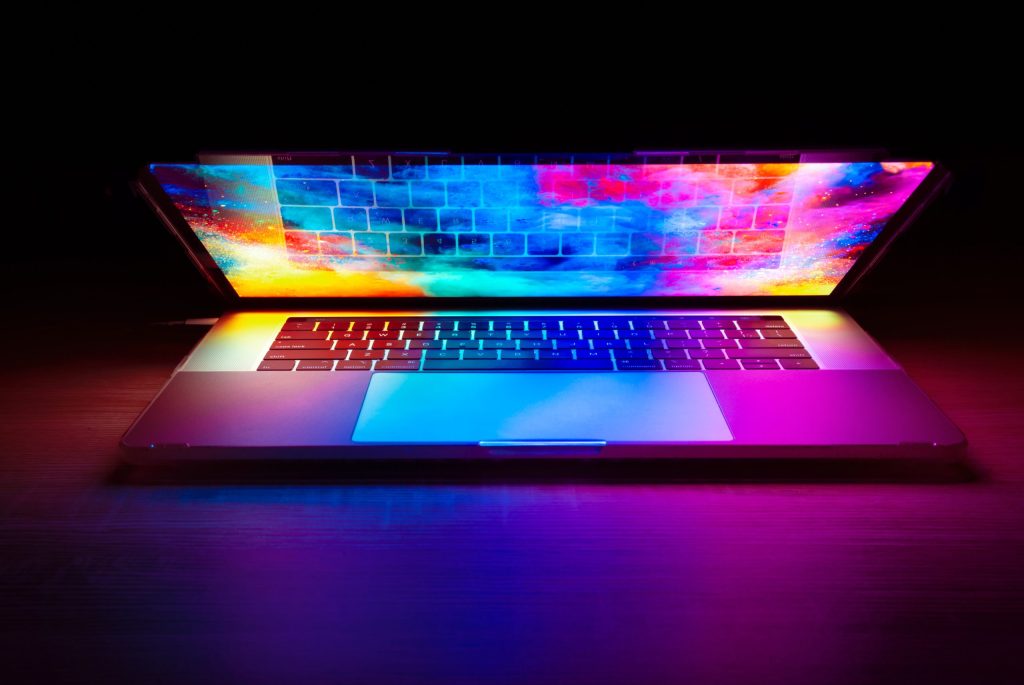 Open Mac laptop with a colorful image